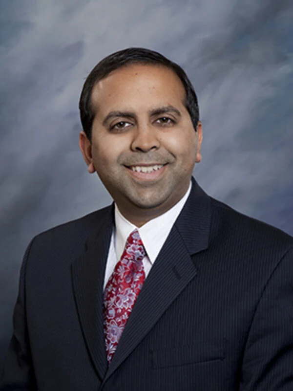 Headshot of Dr. Namath S. Hussain, MD, MBA