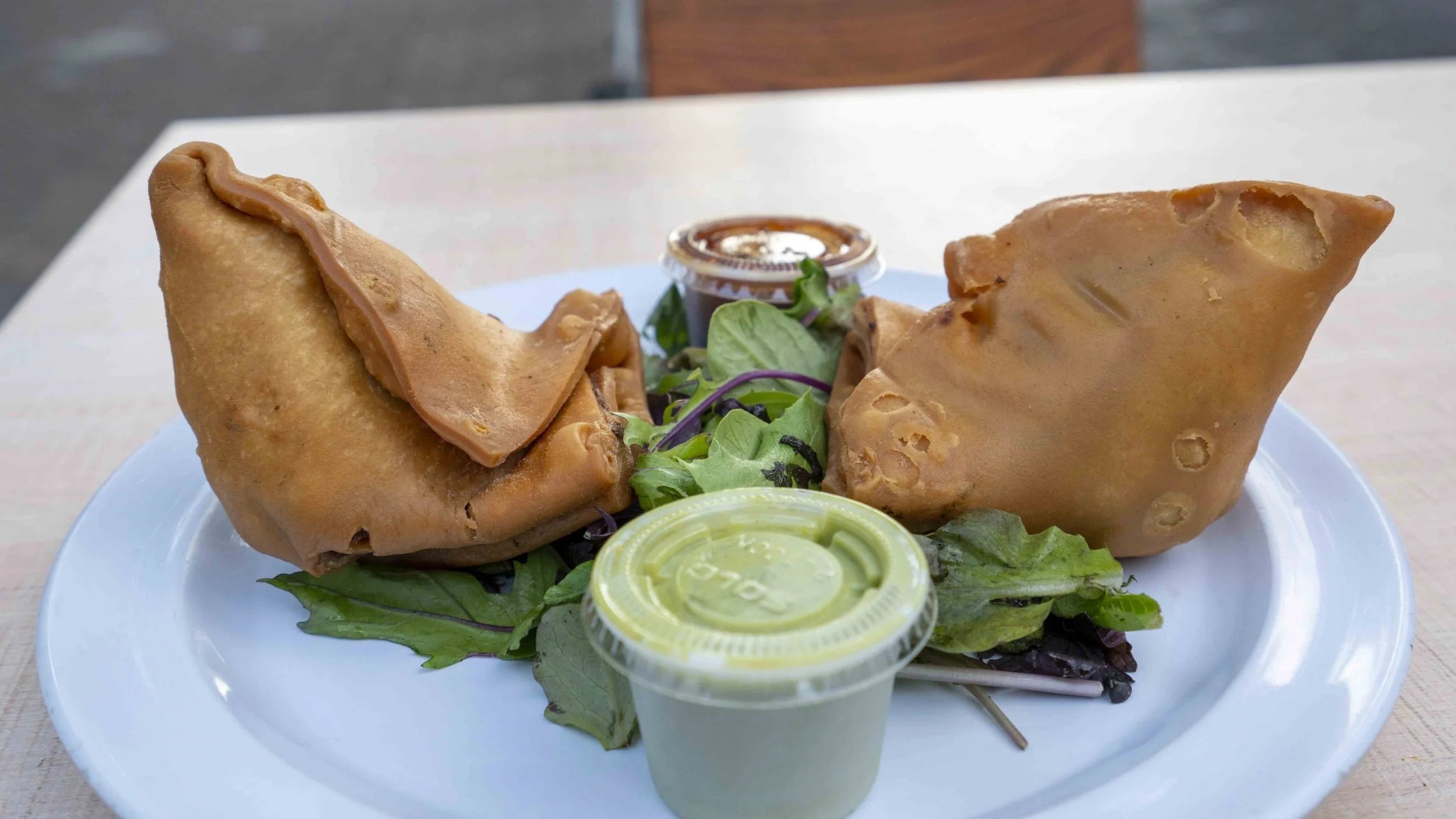Samosas with salad and chutney