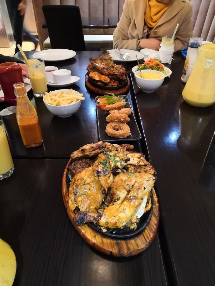 TMG (The Madina Grill) — Websearch photo
